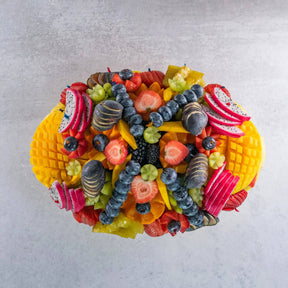 Fresh fruit bowl tropical mango dragon fruit pineapple berries kiwi star fruit