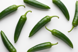 Whole jalapenos with white background